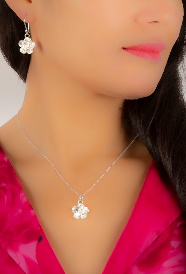 Woman with handmade silver jewelry