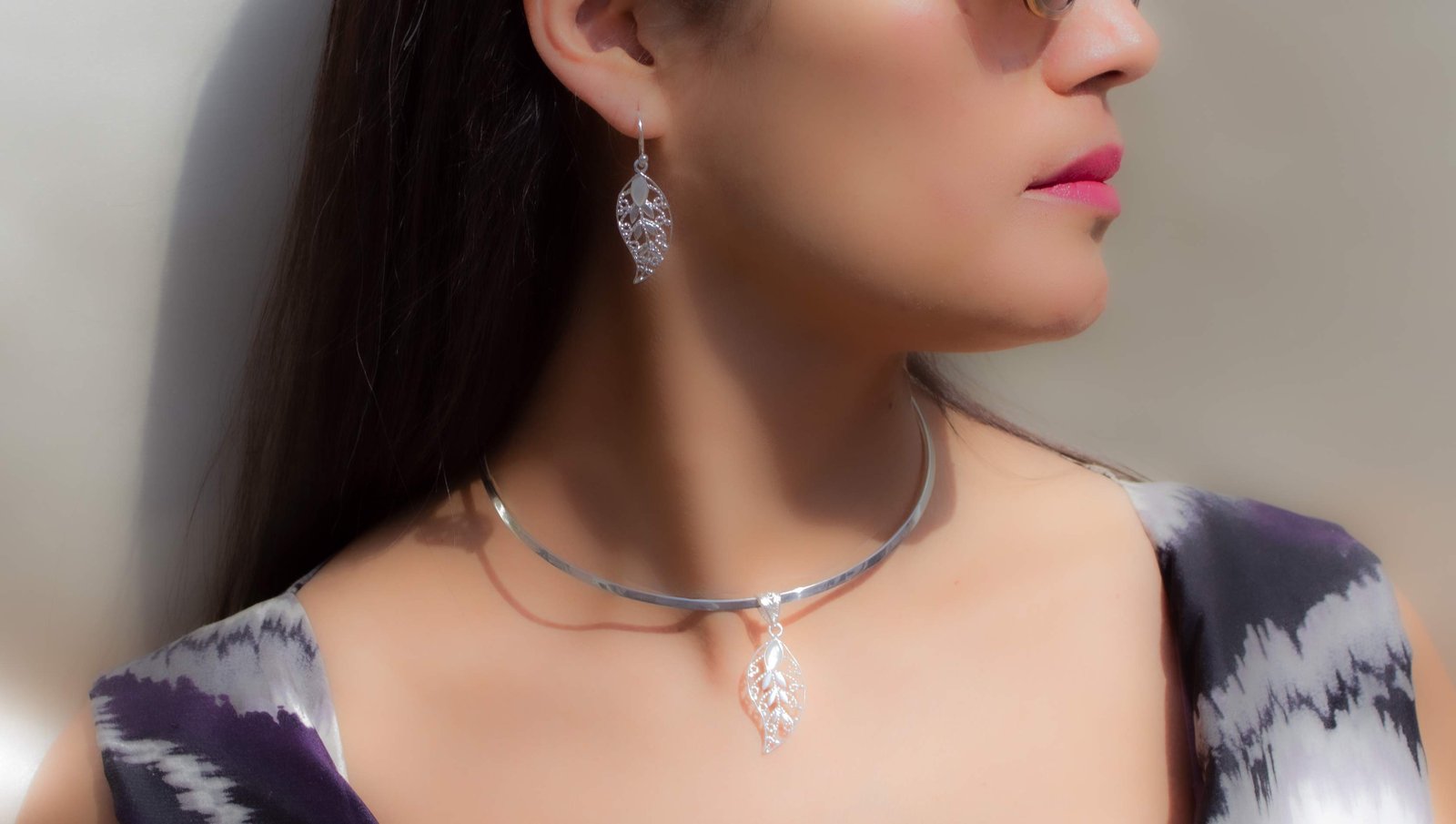 Woman with handmade silver jewelry